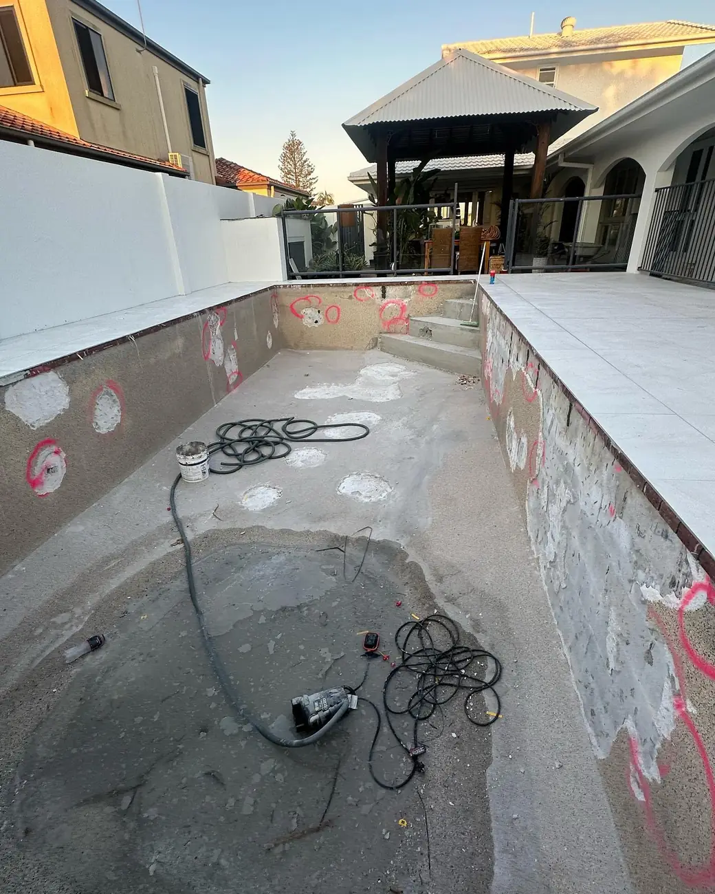 Before: pool stripped back, ready for a new finish