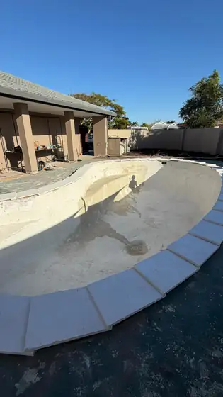 Bundall: waterline tiles, pebblecrete to come