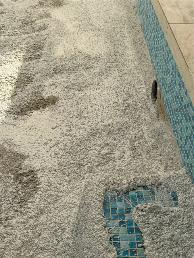 Close-up of a new interior going in against blue waterline tiles